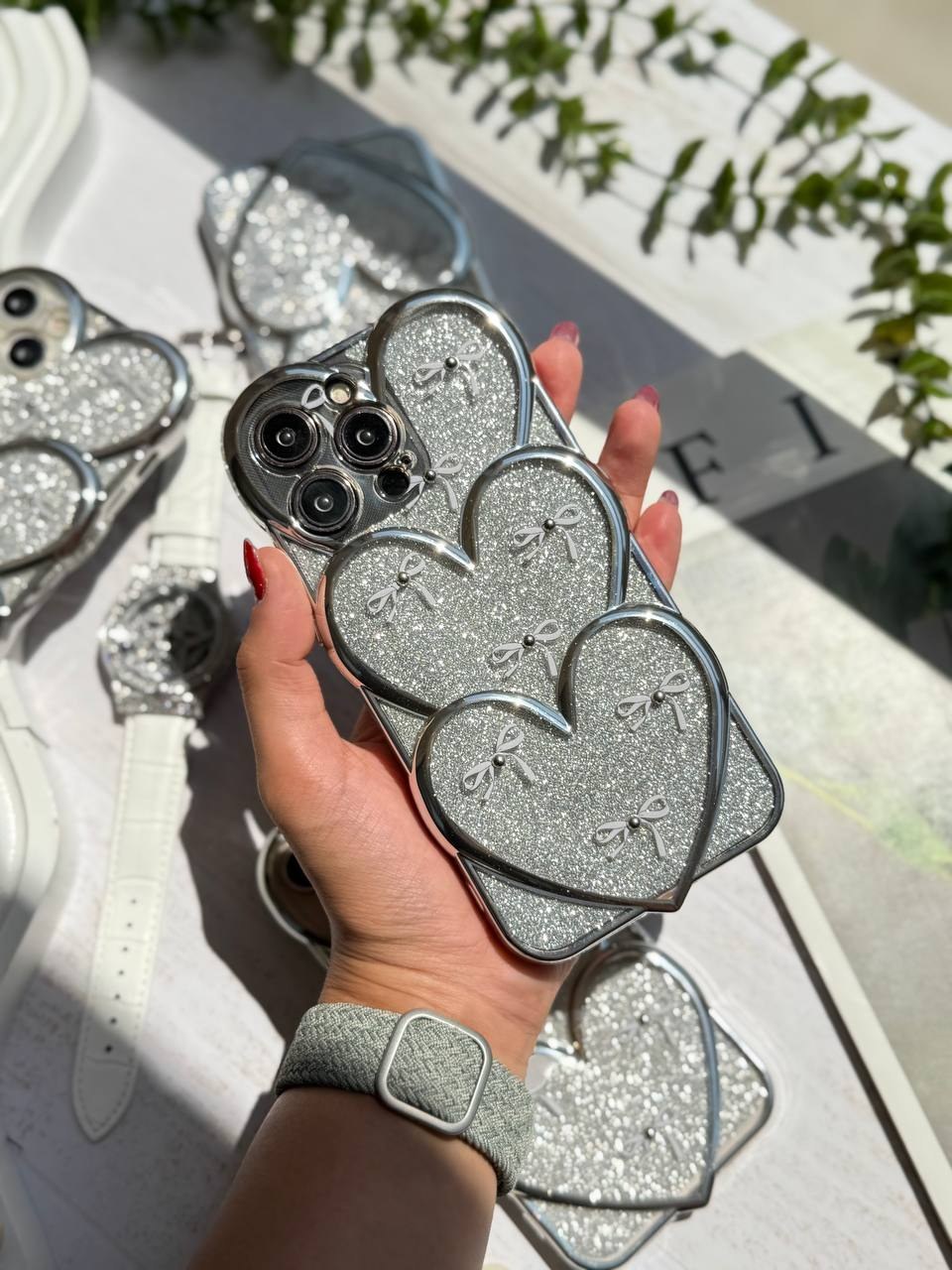Embossed gemstone bow tie heart iPhone 14 Pro Max case with shine sheet